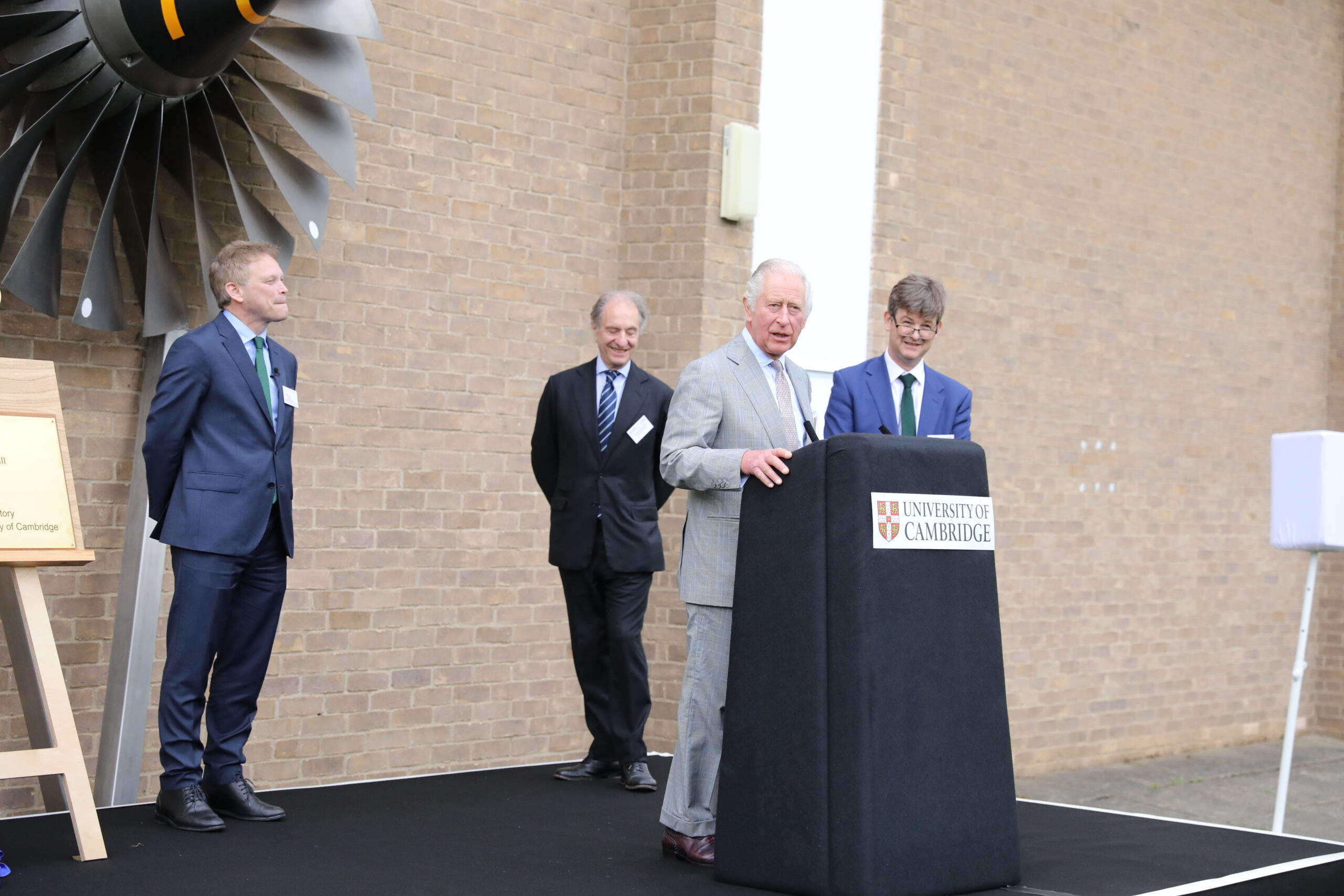 His Majesty The King at the groundbreaking, accompanied by the Rt Hon Grant Shapps MP, Prof Rob Miller, and Dr Anthony Freeling